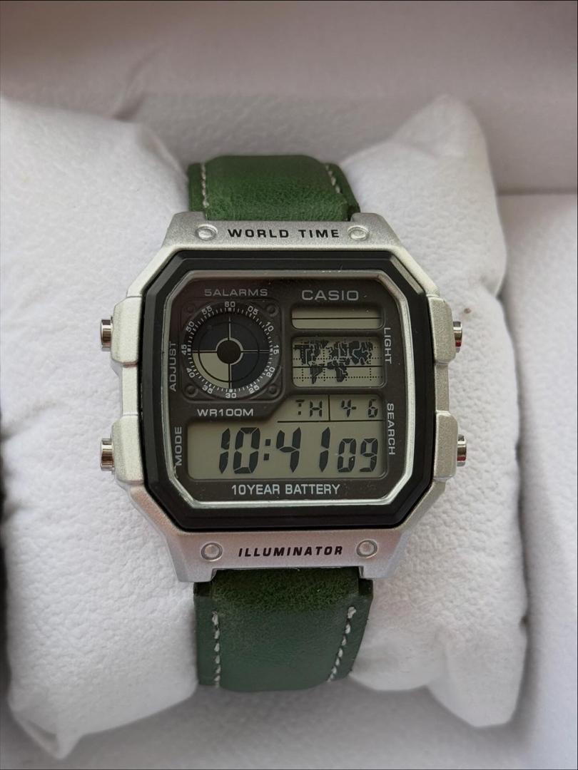 Casio AE-1200WHB World Time Digital Watch – Green Leather Strap