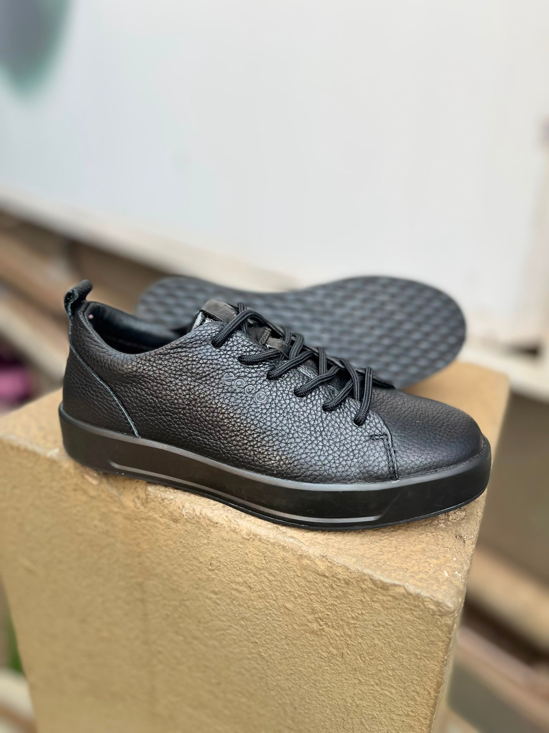 Triple Black Pebbled Leather Low-Top Sneaker