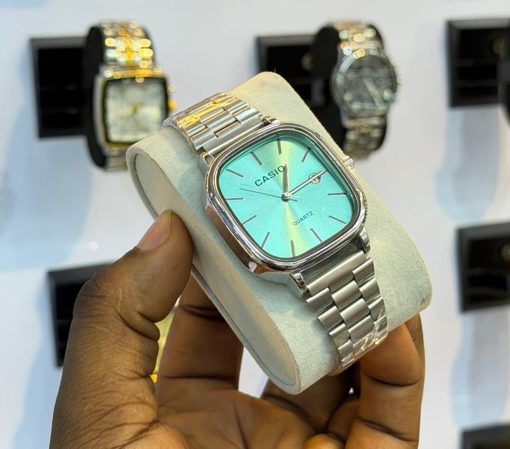 Casio Vintage Quartz Watch – Teal Dial & Silver Metallic Straps