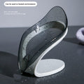 Leaf-shaped self-draining soap dish with water droplets showing humid environment use